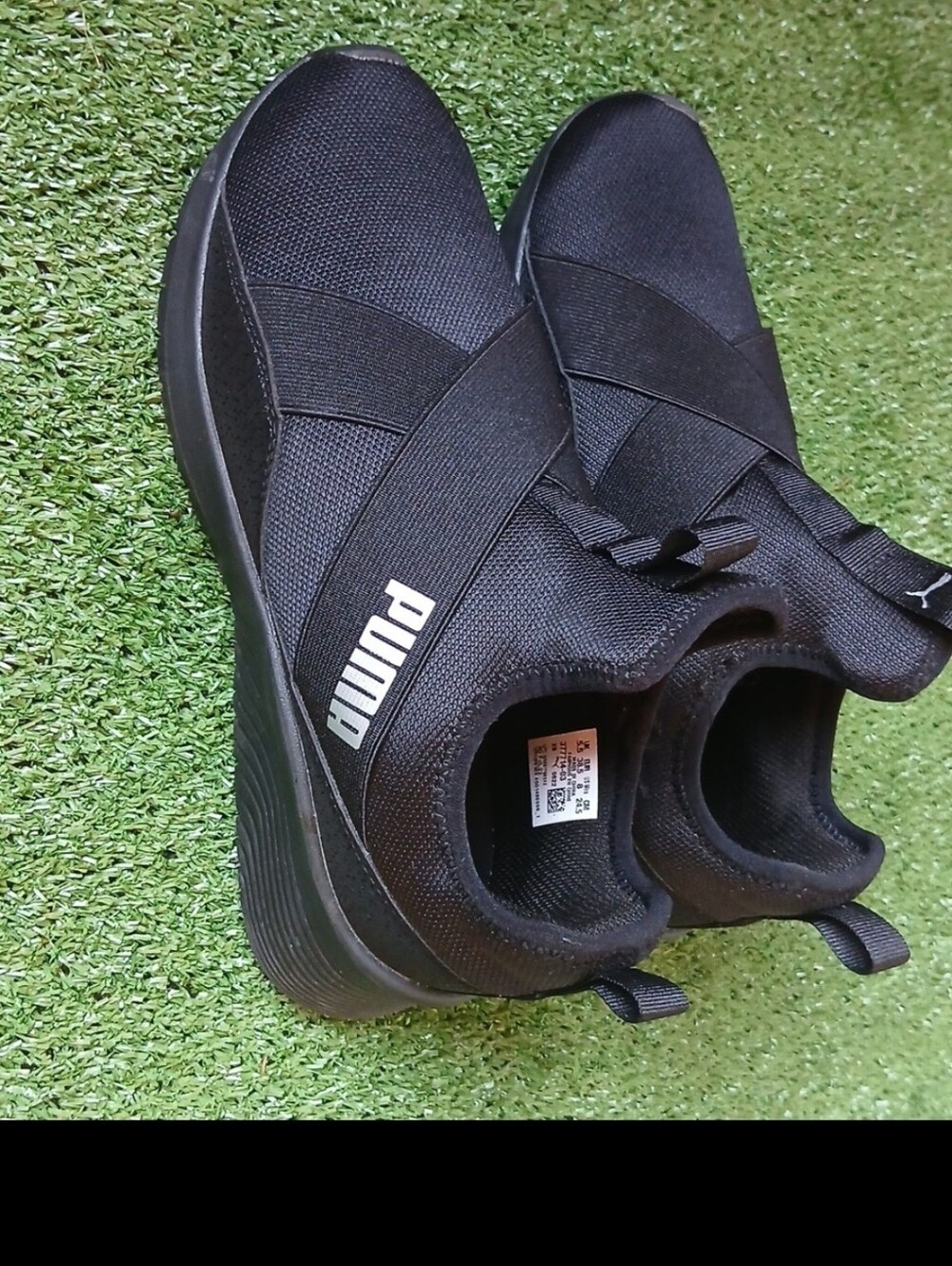 Puma Women's Black Athletic Slip-On Sneakers with White Logo